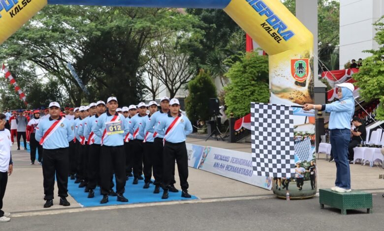 Disbunnak Kalsel Berpartisipasi di Lomba Gerak Jalan Pemprov Kalsel
